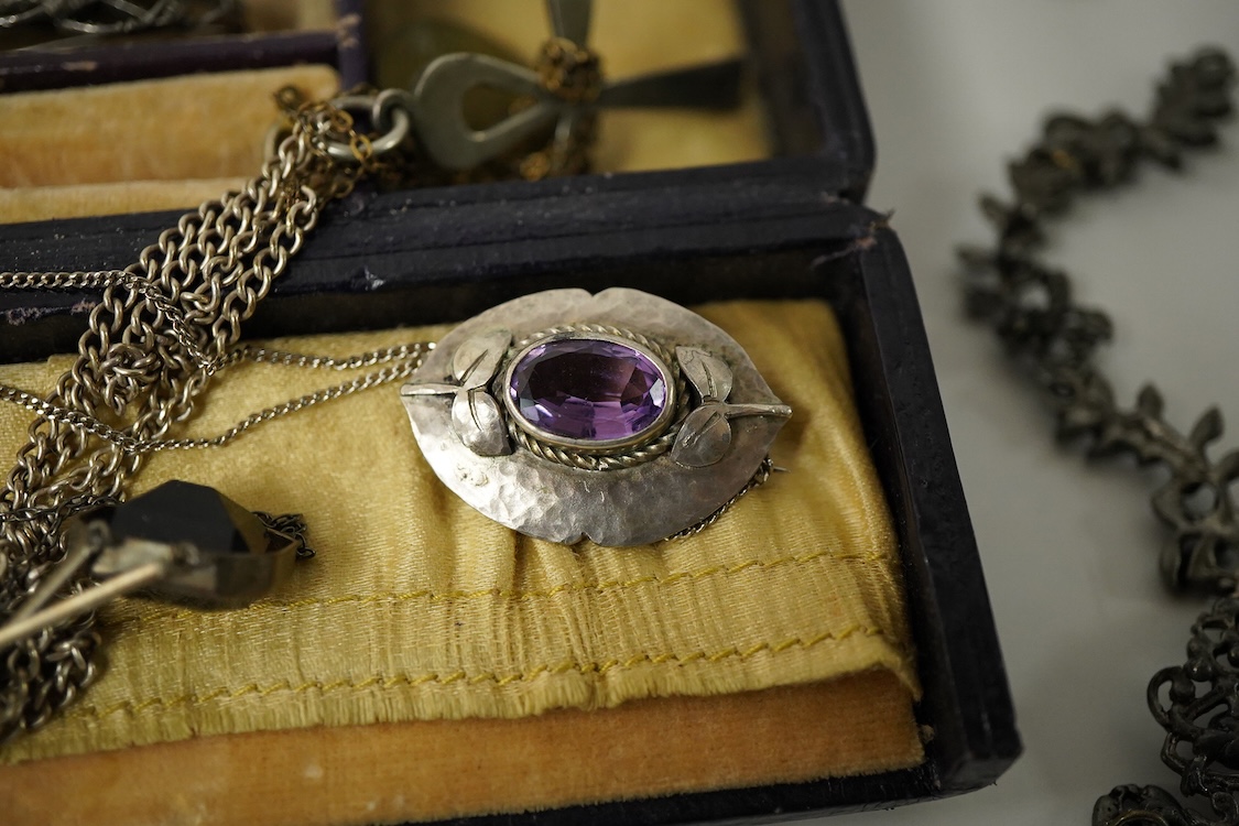 A group of mainly silver and white metal costume jewellery, including a moonstone set brooch, 53mm, a filigree gilt metal and enamel fob and marcasite set bracelet etc.